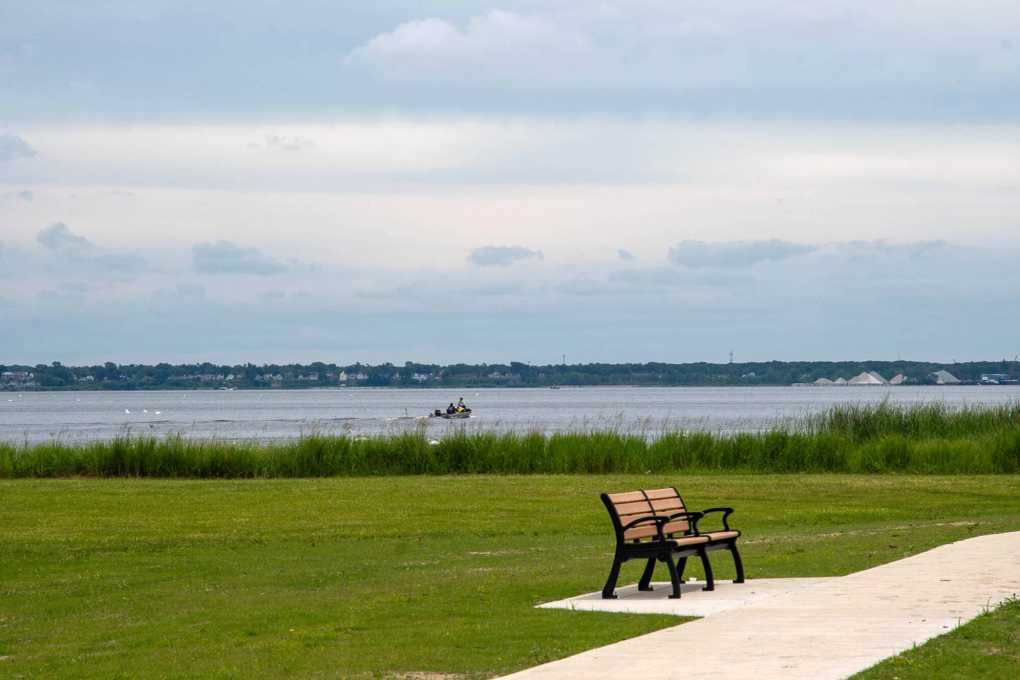 Boaters fish off Leitsma Pier